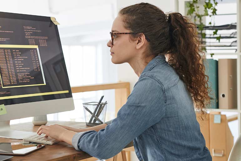 woman working at her computer